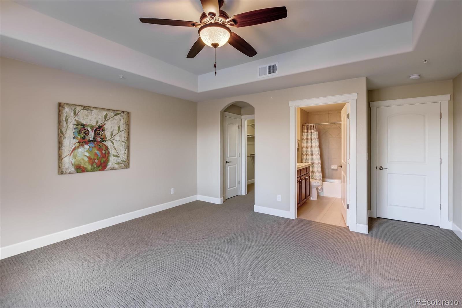2363 Primo Road, Unit E Highlands Ranch, CO 80129 - Photo 28 of 36 a view of a big room with chandelier fan