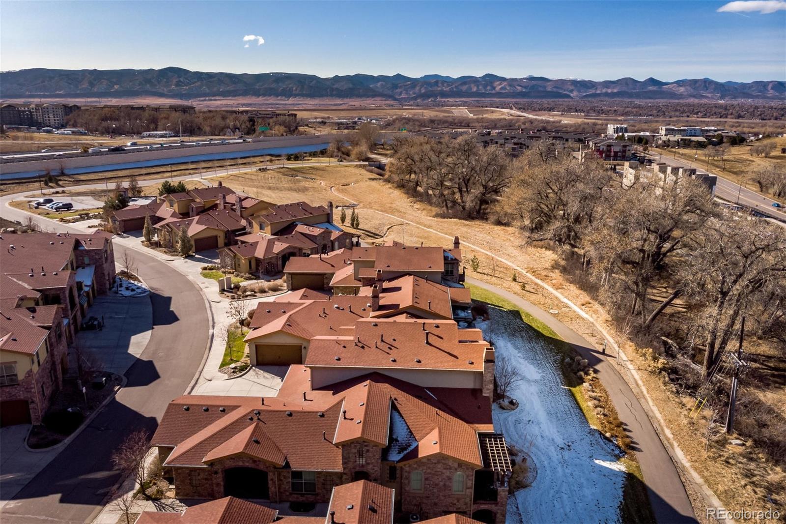2363 Primo Road, Unit E Highlands Ranch, CO 80129 - Photo 33 of 36 an aerial view of residential houses with outdoor space