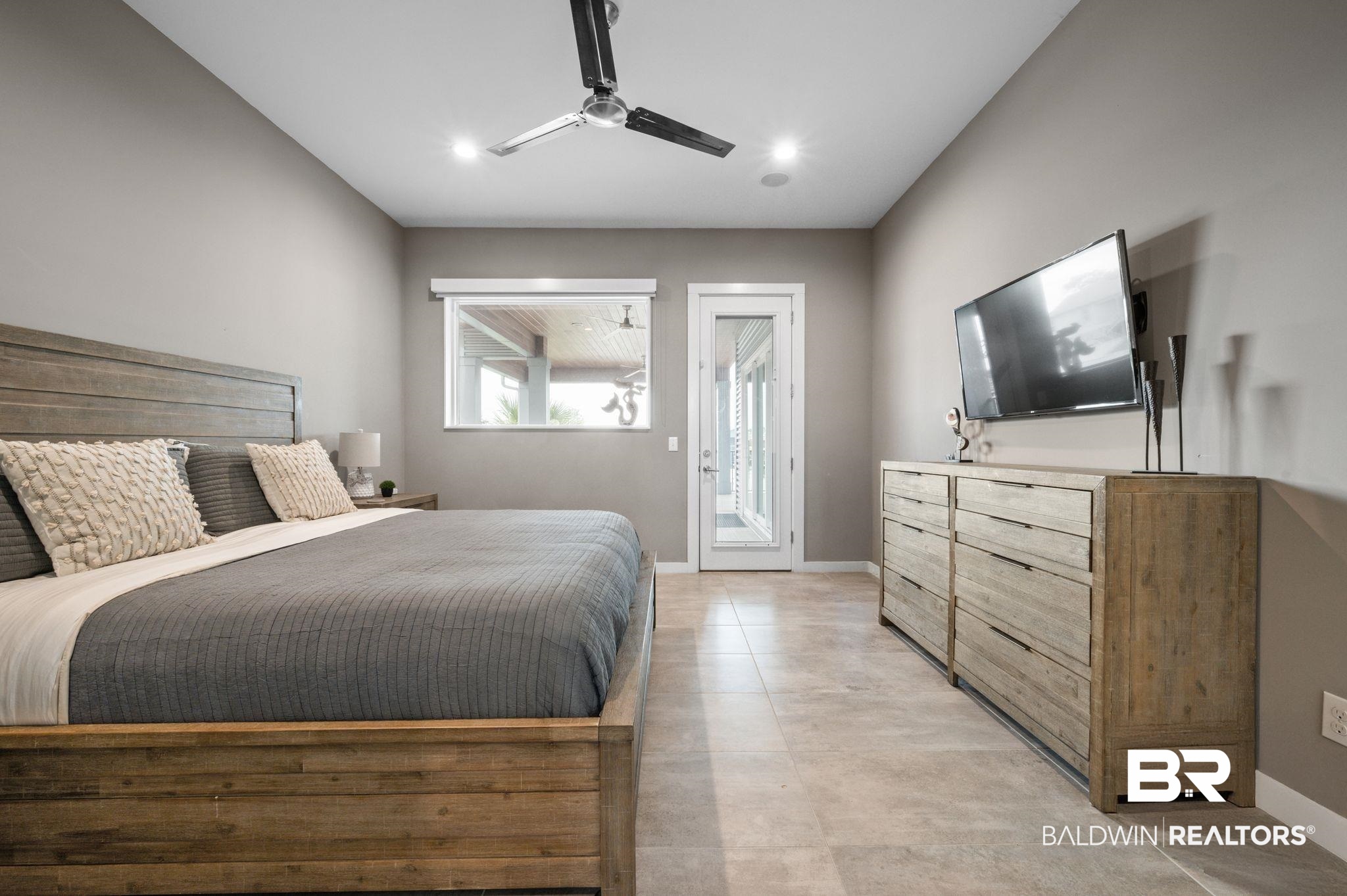 3840 Cotton Way Orange Beach, AL 36561 - Photo 26 of 75 Bedroom featuring access to outside and ceiling fan