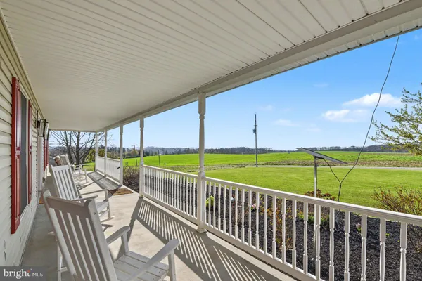 a view of a balcony with an outdoor space