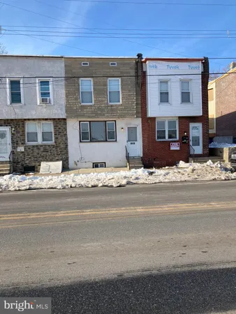 a view of street with large building