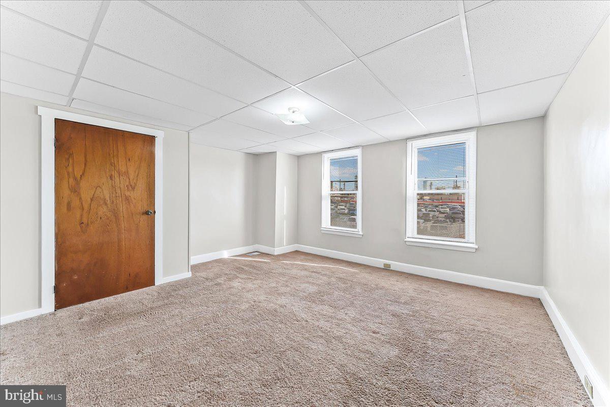 4518 Post Road Marcus Hook, PA 19061 - Photo 17 of 24 a view of an empty room with windows
