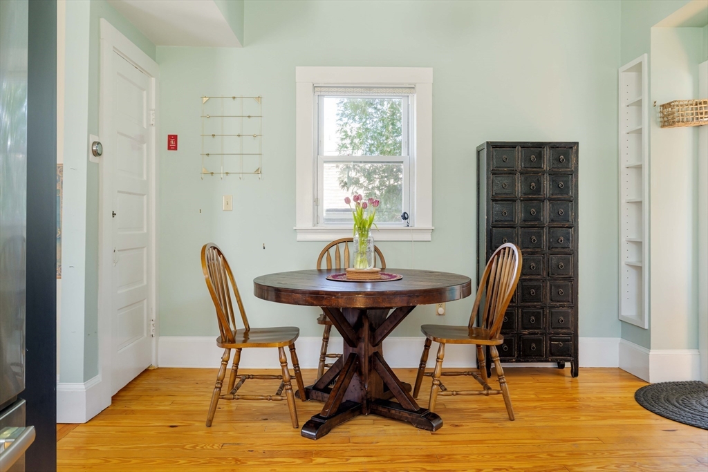 10 Gilman Street Boston, MA 02131 - Photo 15 of 41 a view of a dining room with furniture and window