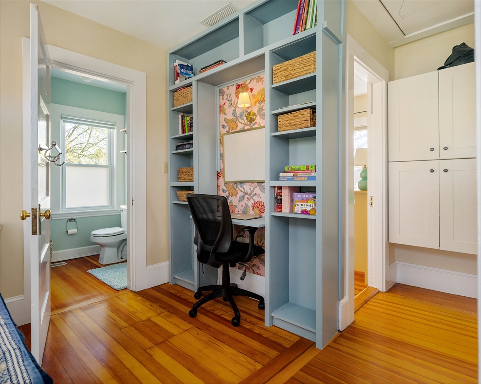 10 Gilman Street Boston, MA 02131 - Photo 21 of 41 a view of a workspace with furniture and a window