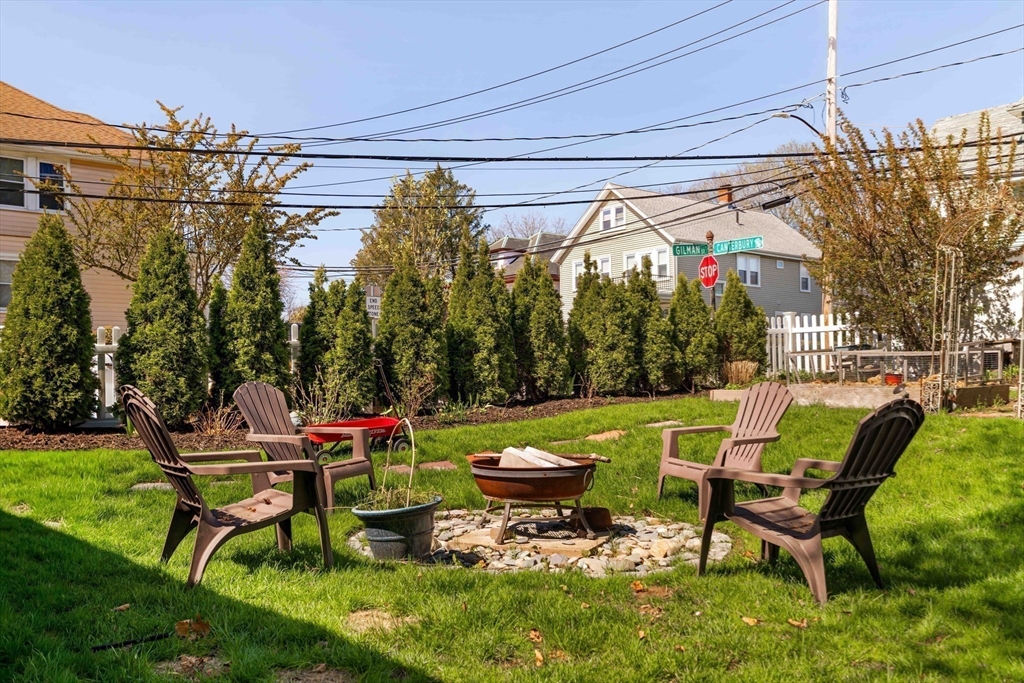10 Gilman Street Boston, MA 02131 - Photo 33 of 41 a swimming pool with outdoor seating and yard