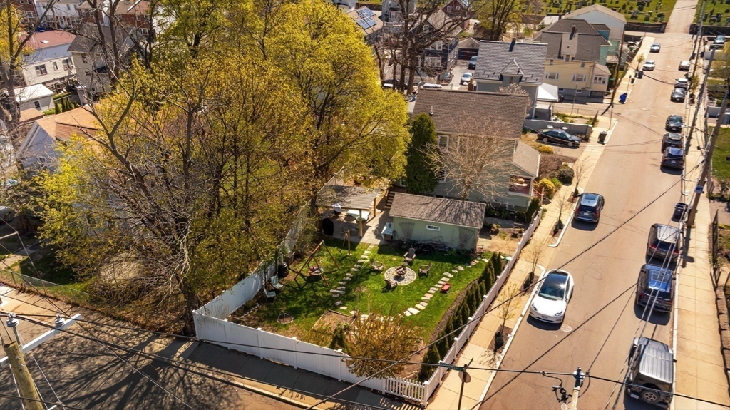 10 Gilman Street Boston, MA 02131 - Photo 39 of 41 an aerial view of multiple houses with yard