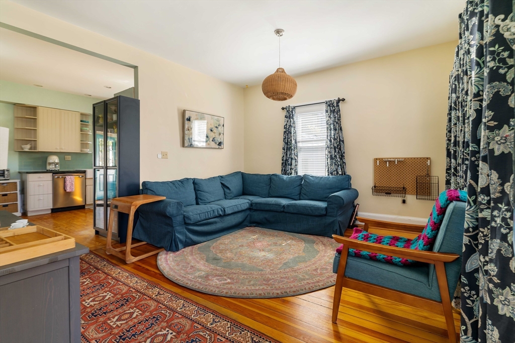 10 Gilman Street Boston, MA 02131 - Photo 4 of 41 a living room with furniture and a couch