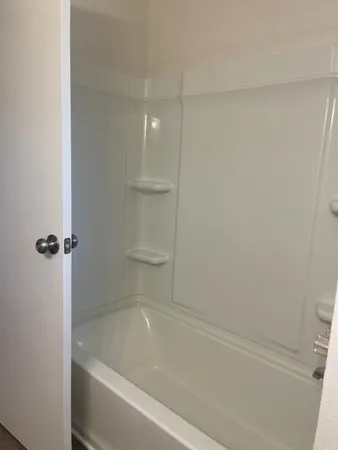 a bathroom with a bathtub