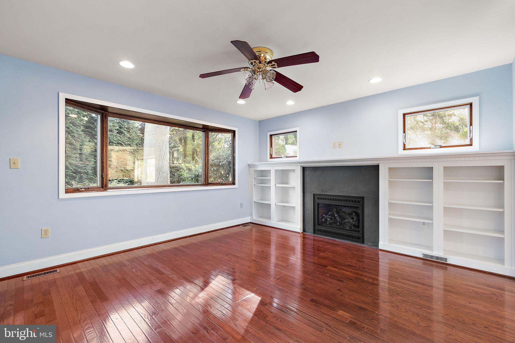 9 Granite Road Wilmington, DE 19803 - Photo 18 of 55 a view of empty room with wooden floor and fireplace