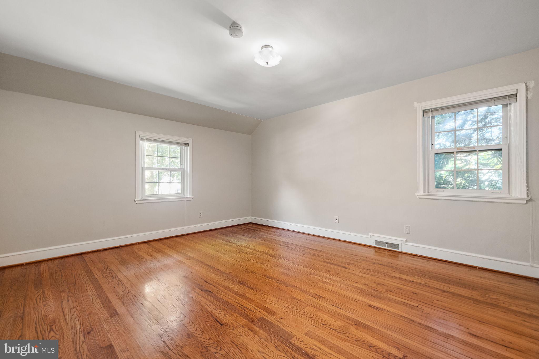 9 Granite Road Wilmington, DE 19803 - Photo 26 of 55 a view of an empty room with wooden floor and a window