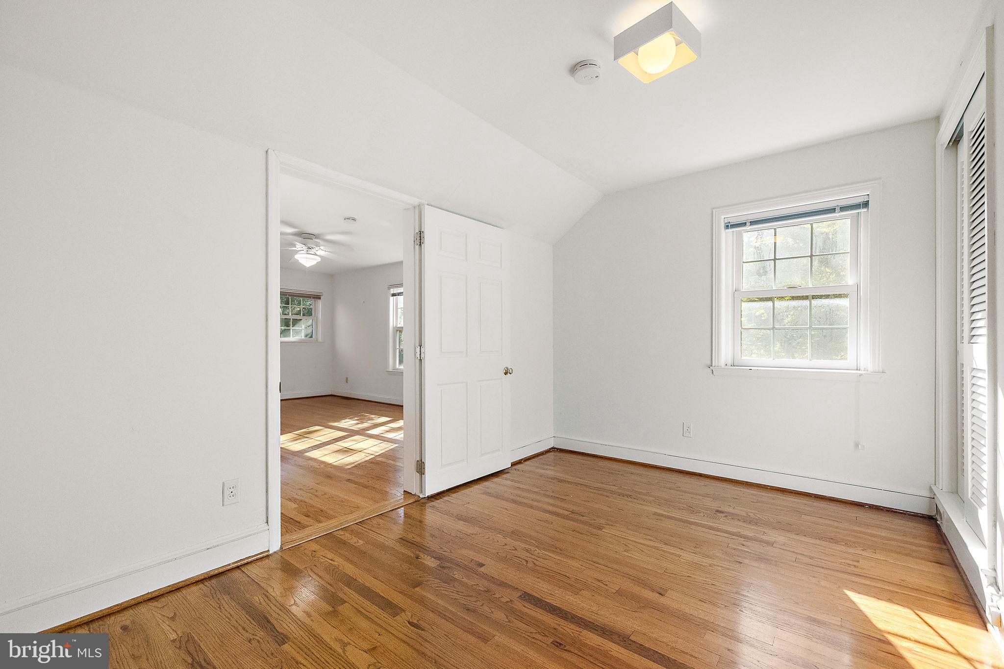 9 Granite Road Wilmington, DE 19803 - Photo 34 of 55 an empty room with wooden floor and windows