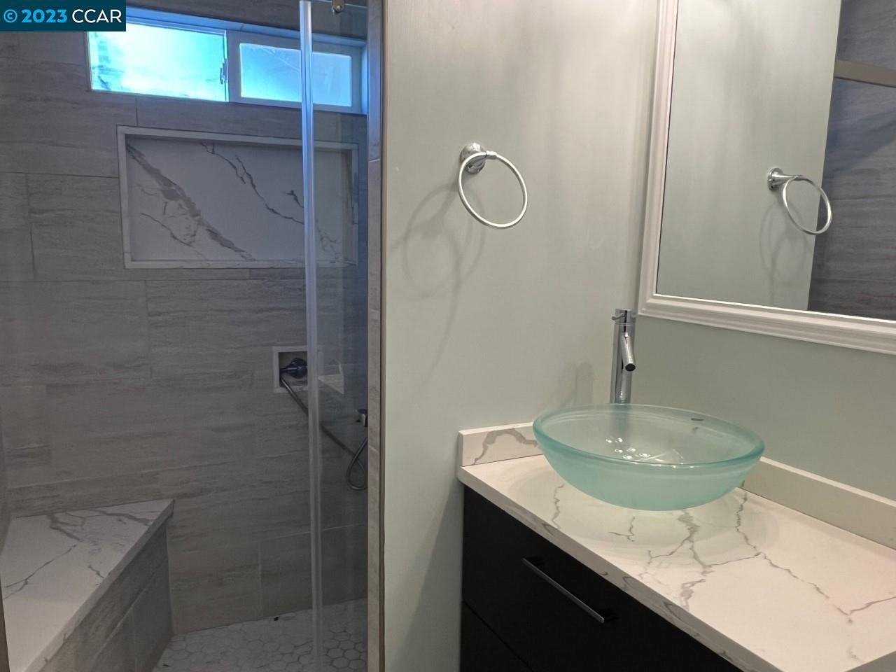 3620 Chestnut Street Lafayette, CA 94549 - Photo 12 of 19 a bathroom with a sink a toilet and shower