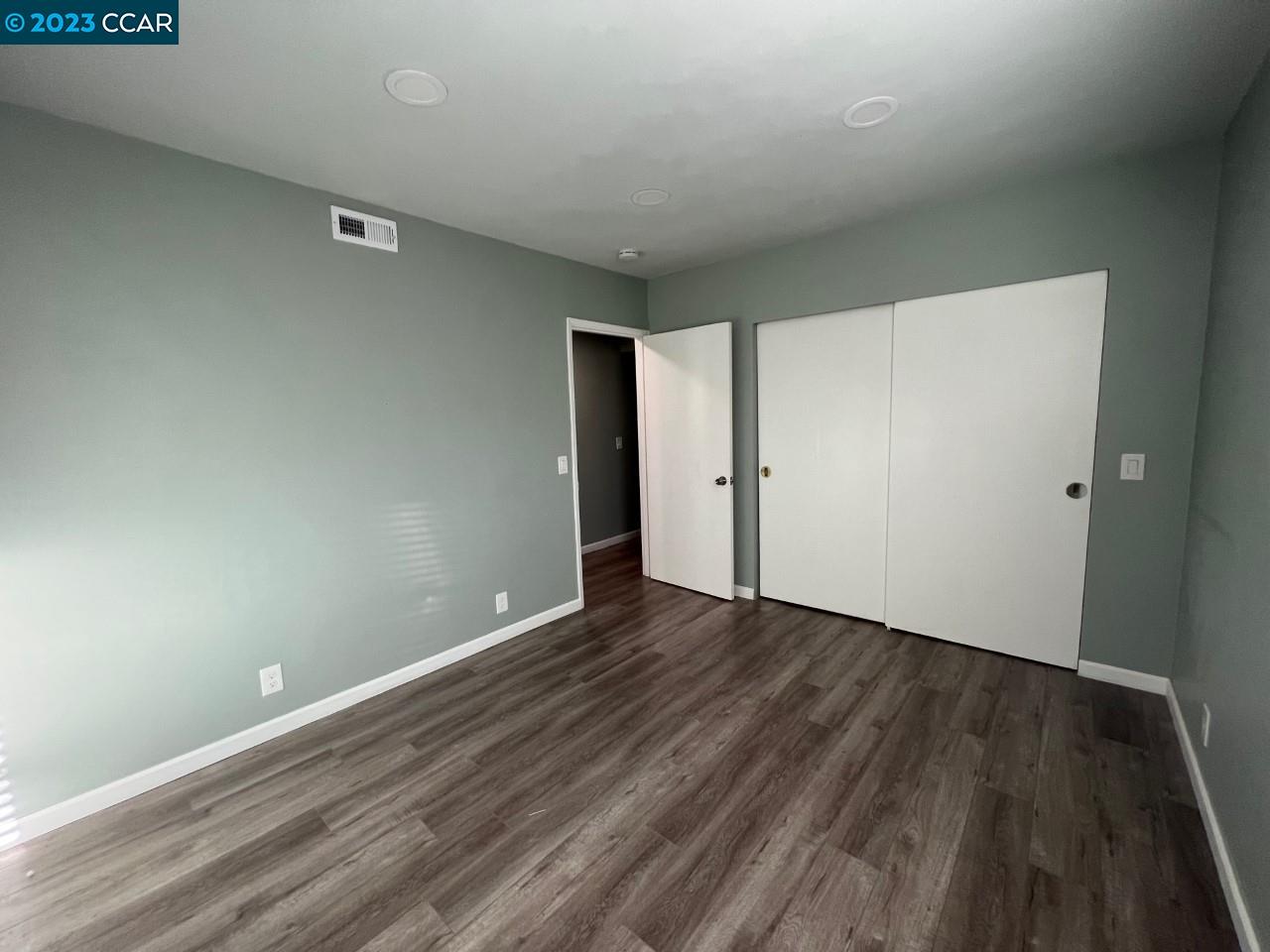 3620 Chestnut Street Lafayette, CA 94549 - Photo 16 of 19 a view of an empty room with wooden floor