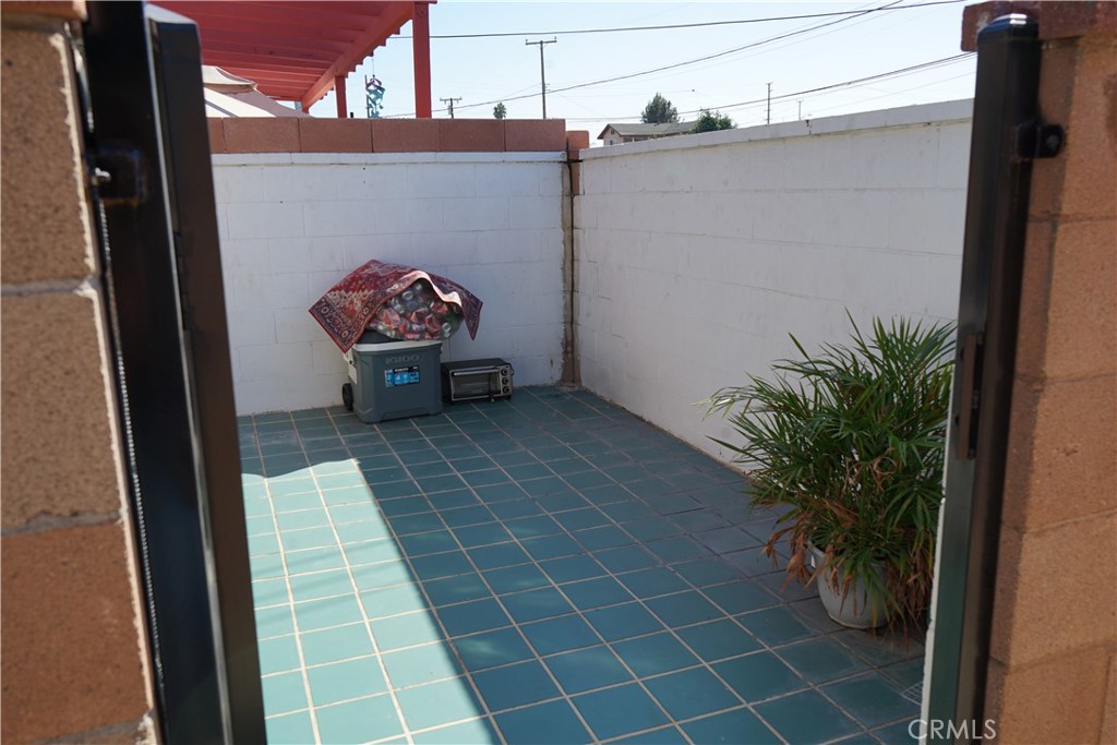14510 Amar Road, Unit J La Puente, CA 91744 - Photo 7 of 7 a vase of flowers sitting on a table