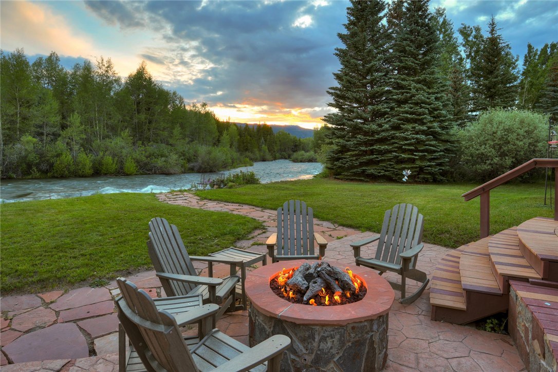 385 Riverside Drive Silverthorne, CO 80498 - Photo 30 of 35 An evening well spent is by the river! Note: The fire pit set is NOT included in the sale.