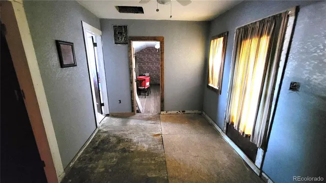 a view of a kitchen with seating area