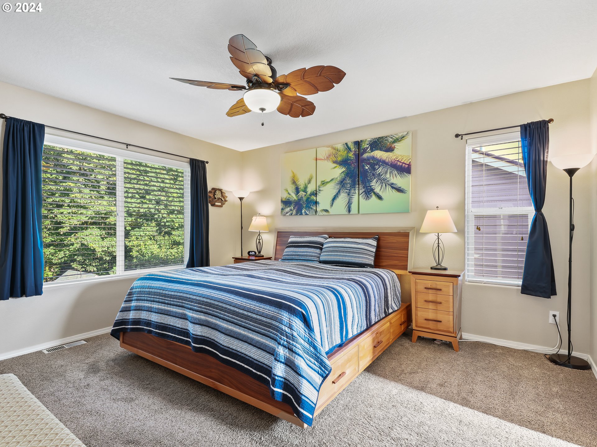 4888 Southeast Antelope Hills Gresham, OR 97080 - Photo 22 of 45 a bedroom with a bed and a large window