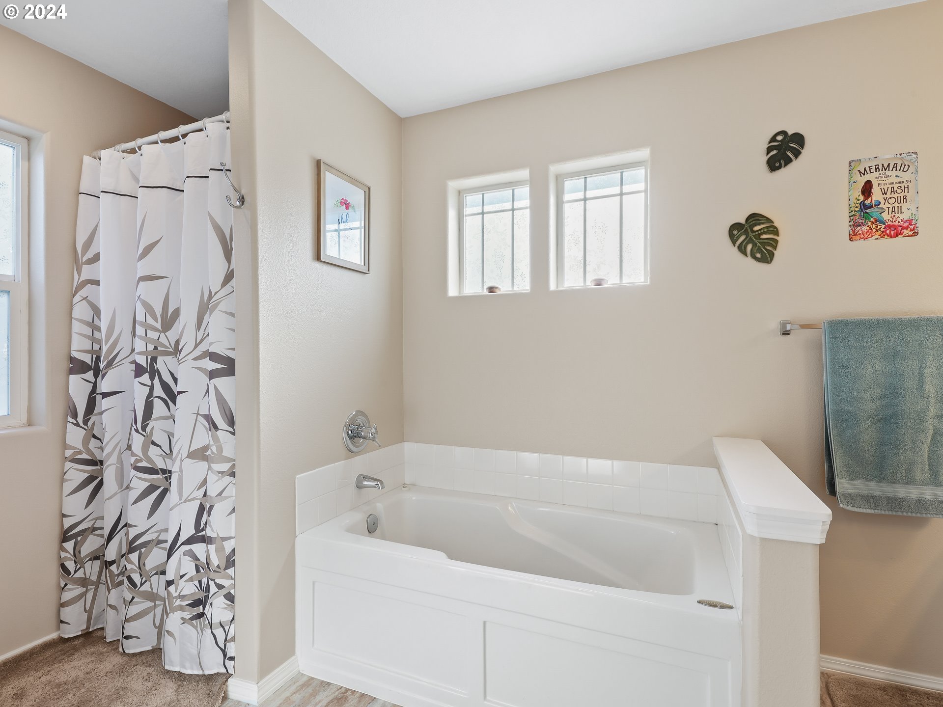 4888 Southeast Antelope Hills Gresham, OR 97080 - Photo 26 of 45 a bathroom with a bathtub and shower