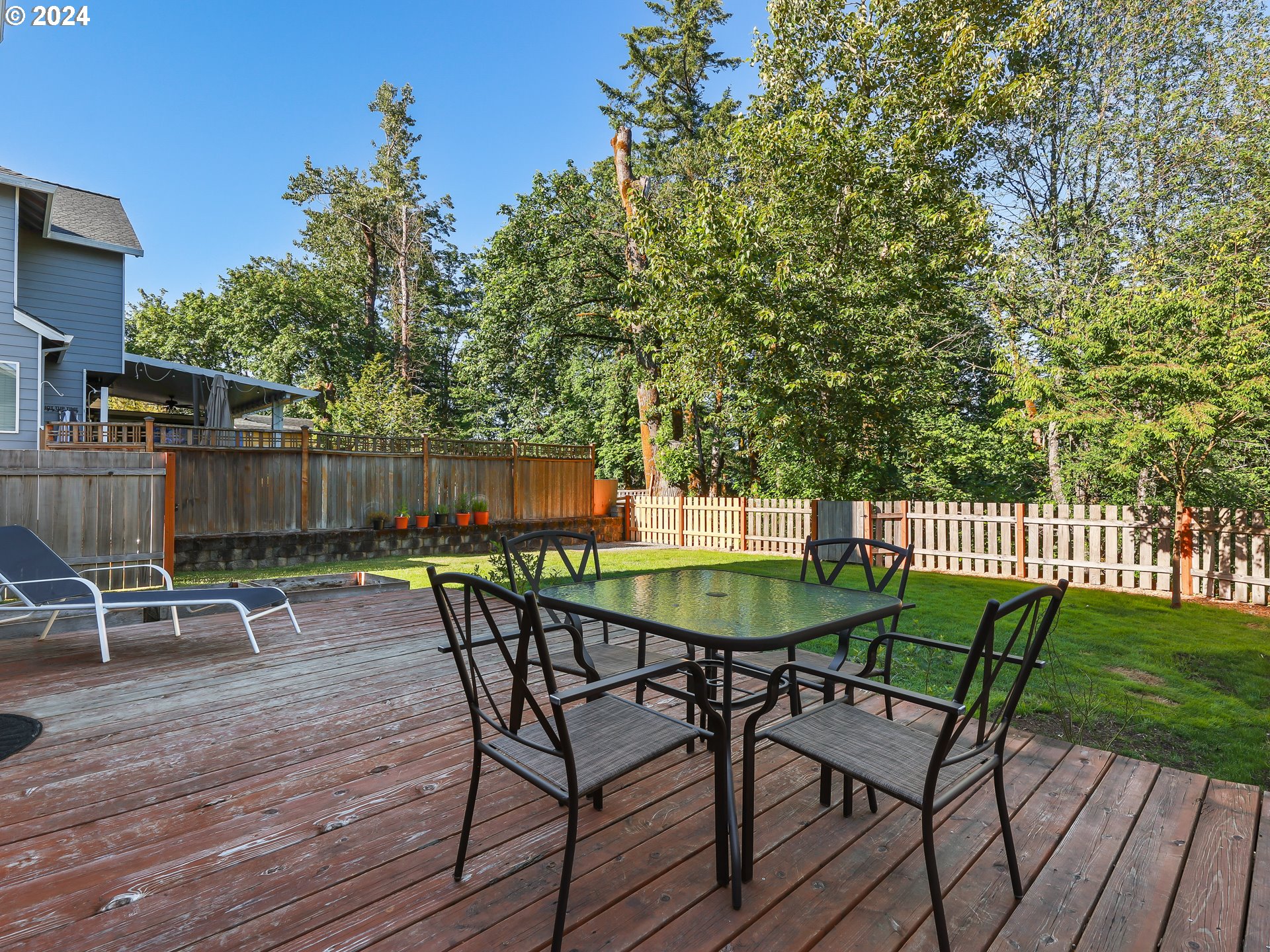 4888 Southeast Antelope Hills Gresham, OR 97080 - Photo 33 of 45 a view of a chairs and table on the deck