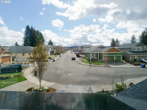 a view of a street with houses
