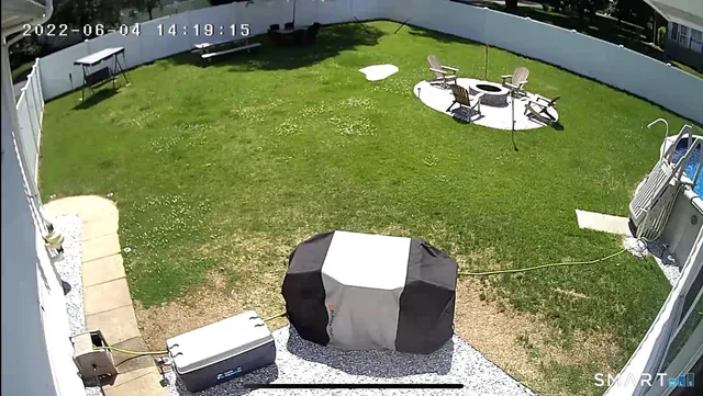 a view of swimming pool from a balcony