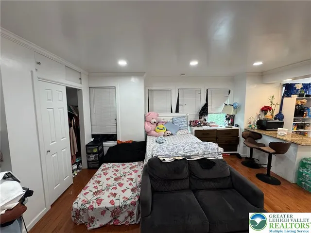 a kitchen with a stove and cabinets