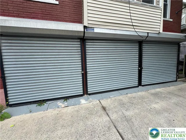a view of a house with a garage