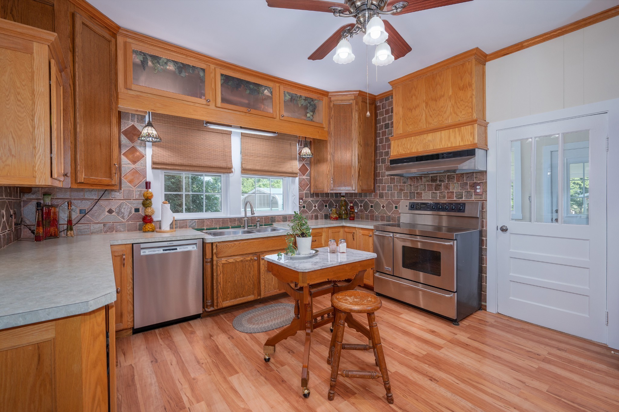 4432 Barren Plains Road Springfield, TN 37172 - Photo 3 of 36 a kitchen with a stove a sink and a refrigerator