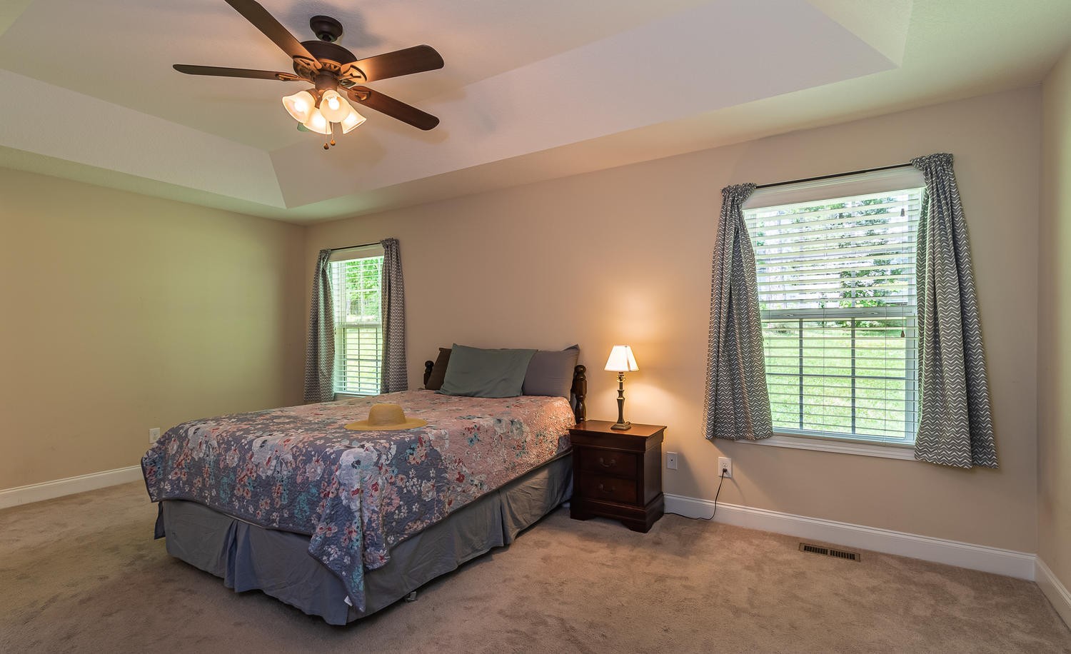 7461 Openview Lane Corryton, TN 37721 - Photo 12 of 20 a bedroom with a bed and a chandelier