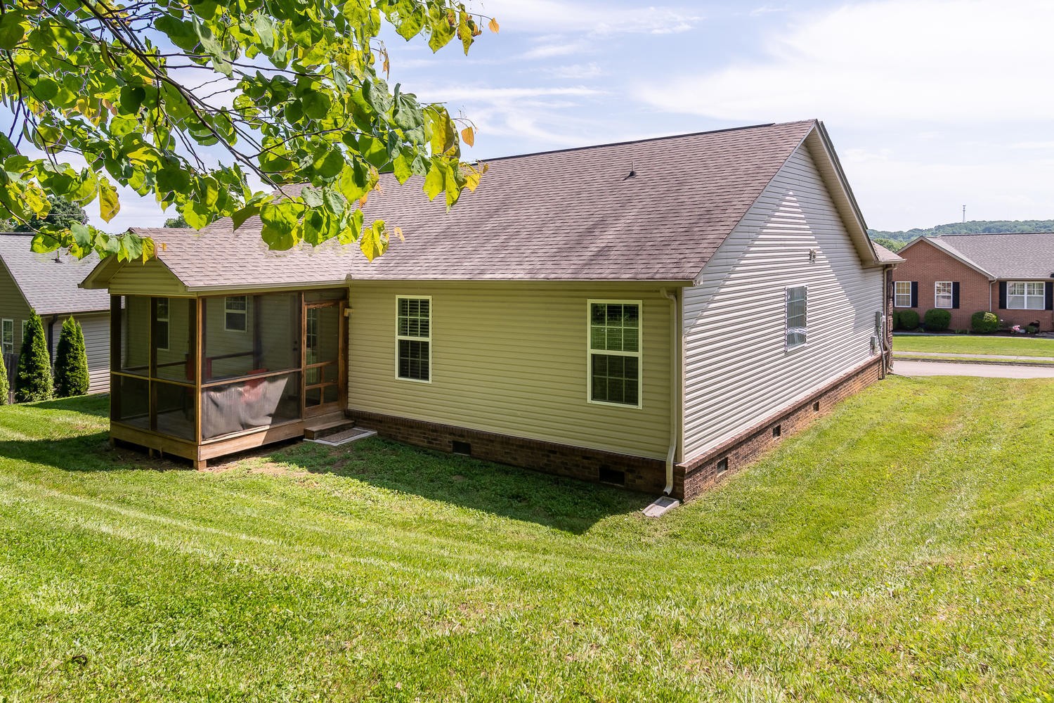 7461 Openview Lane Corryton, TN 37721 - Photo 18 of 20 a view of a house with a yard and sitting area