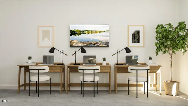 a view of a workspace with furniture