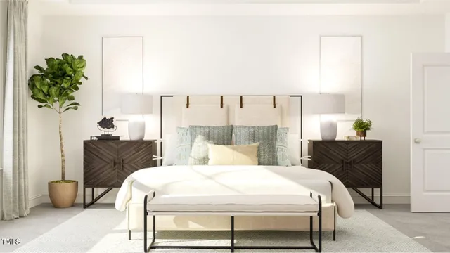 a bedroom with a bed and a couch