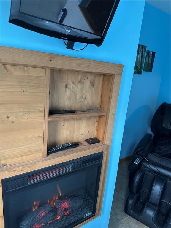 30 Ray Road Greenville, PA 16125 - Photo 23 of 32 Spa room with electric fireplace , TV and massage chair