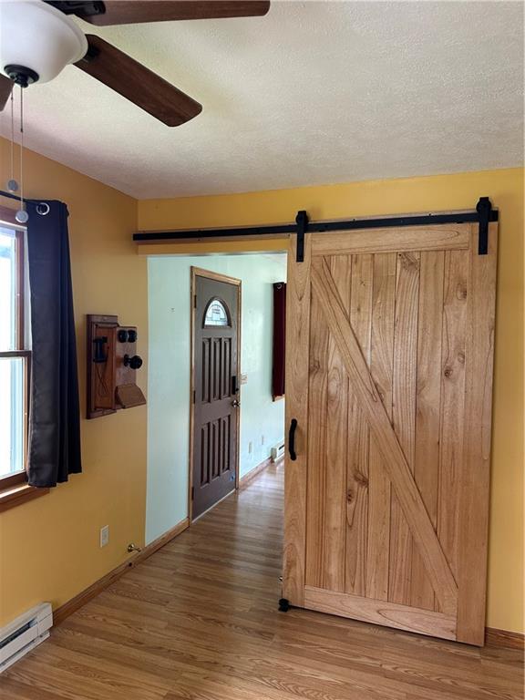 30 Ray Road Greenville, PA 16125 - Photo 9 of 32 Eating area barn door to living room