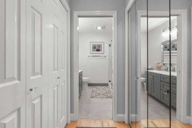 a bathroom with a shower and a sink