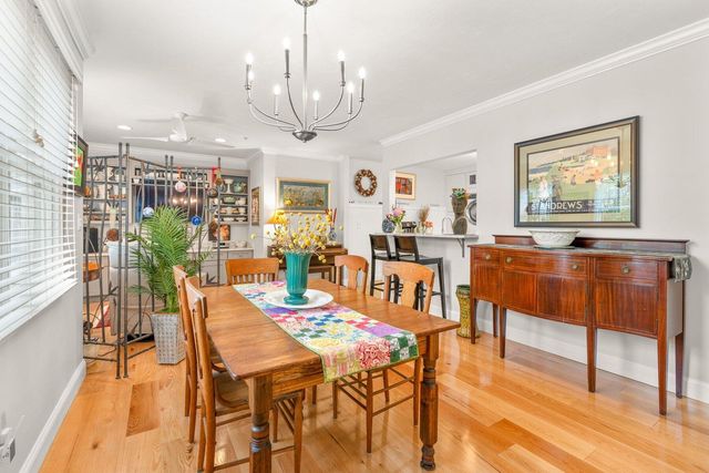 a view of a dining room with furniture