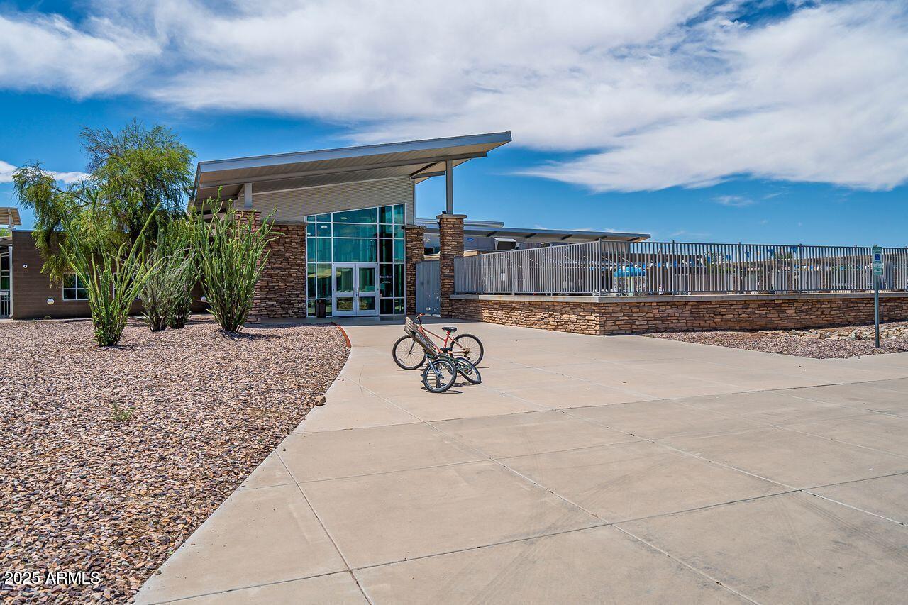 4750 East Chromium Road San Tan Valley, AZ 85143 - Photo 37 of 74 a view of swimming pool with outdoor seating and plants