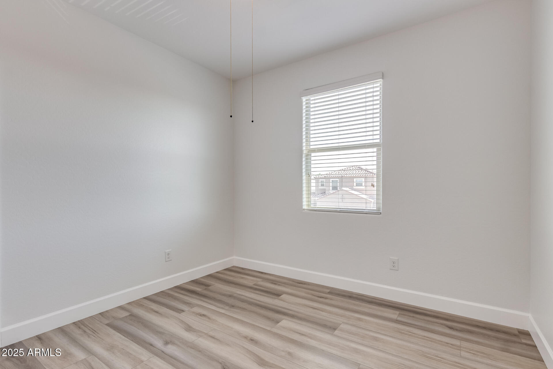 4750 East Chromium Road San Tan Valley, AZ 85143 - Photo 65 of 74 an empty room with a window