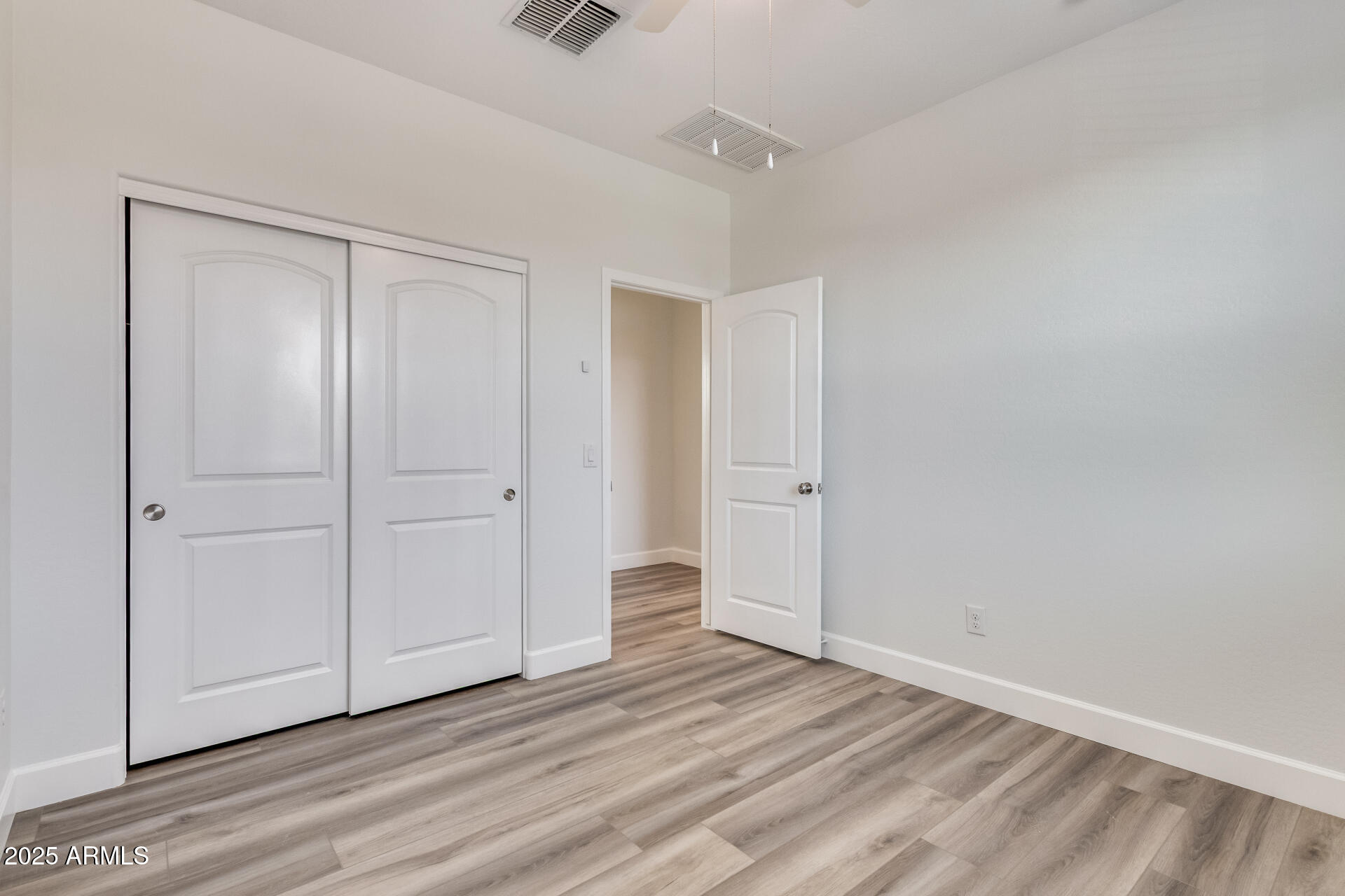 4750 East Chromium Road San Tan Valley, AZ 85143 - Photo 66 of 74 a view of a livingroom with wooden floor