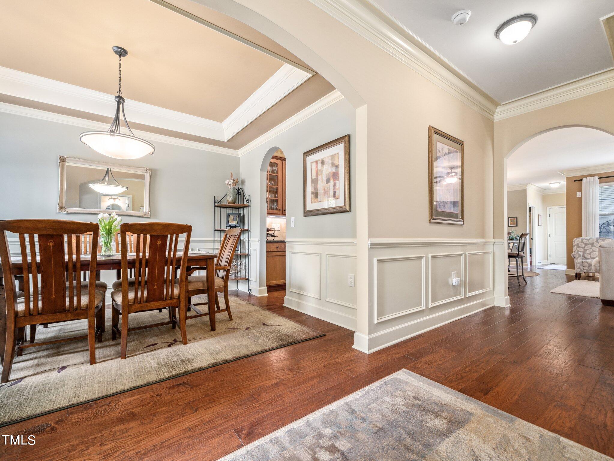 2319 Lowden Street Raleigh, NC 27608 - Photo 3 of 48 a view of a dining room with furniture window and wooden floor