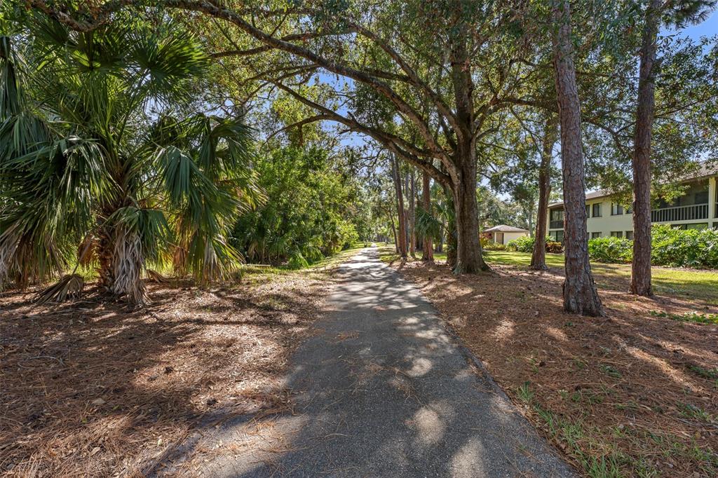 5290 Willow Links, Unit 57 Sarasota, FL 34235 - Photo 29 of 46 a view of outdoor space and yard