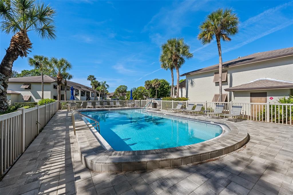 5290 Willow Links, Unit 57 Sarasota, FL 34235 - Photo 34 of 46 a view of swimming pool with outdoor seating