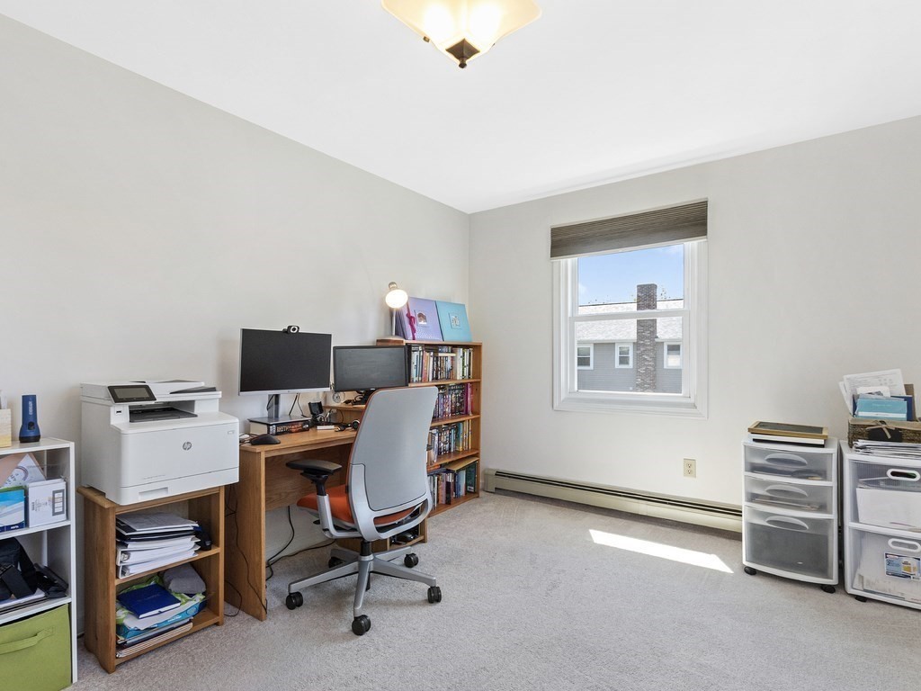 17 Central Street, Unit 2 Waltham, MA 02453 - Photo 26 of 39 a view of a workspace with furniture