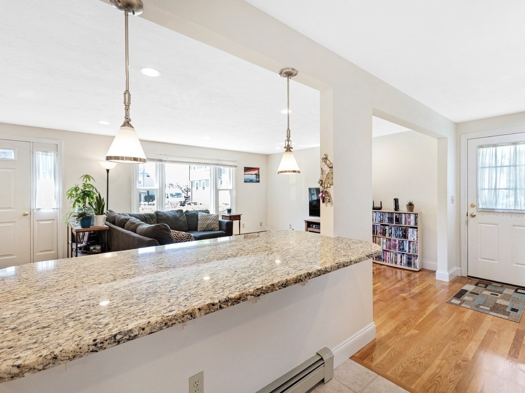 17 Central Street, Unit 2 Waltham, MA 02453 - Photo 10 of 39 a view of a living room and kitchen