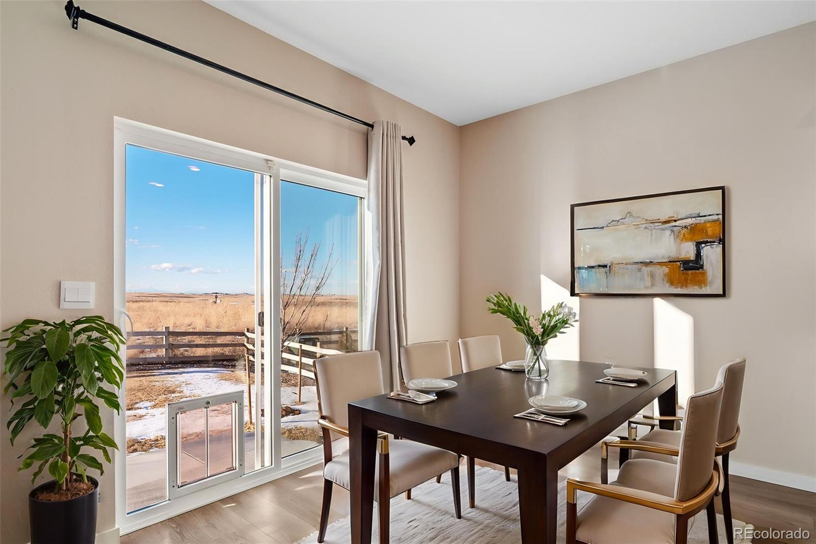 3018 Belleville Ridge Road Elizabeth, CO 80107 - Photo 12 of 32 a view of a workspace with furniture and a potted plant