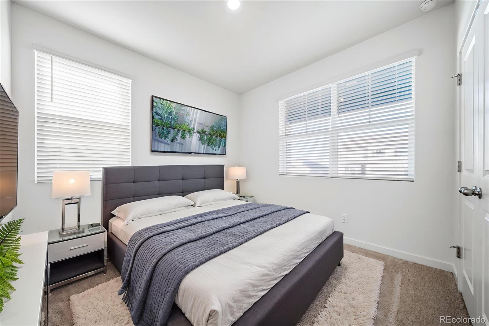 3018 Belleville Ridge Road Elizabeth, CO 80107 - Photo 20 of 32 a bedroom with a bed and a window
