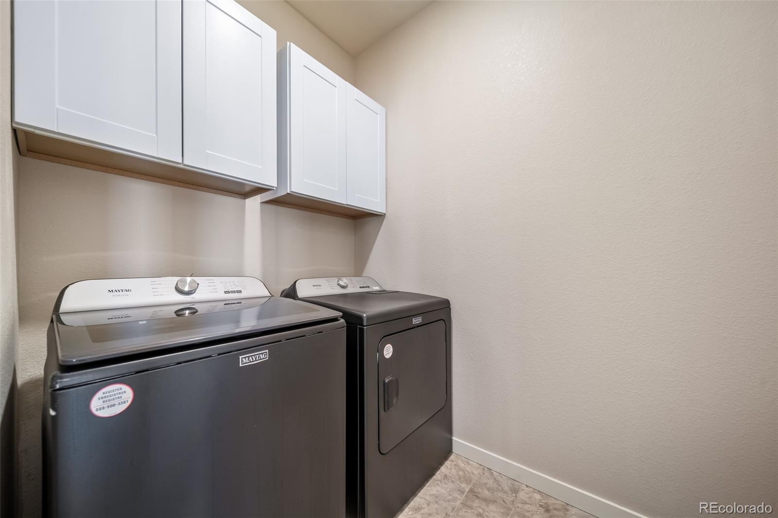 3018 Belleville Ridge Road Elizabeth, CO 80107 - Photo 23 of 32 a utility room with dryer and washer