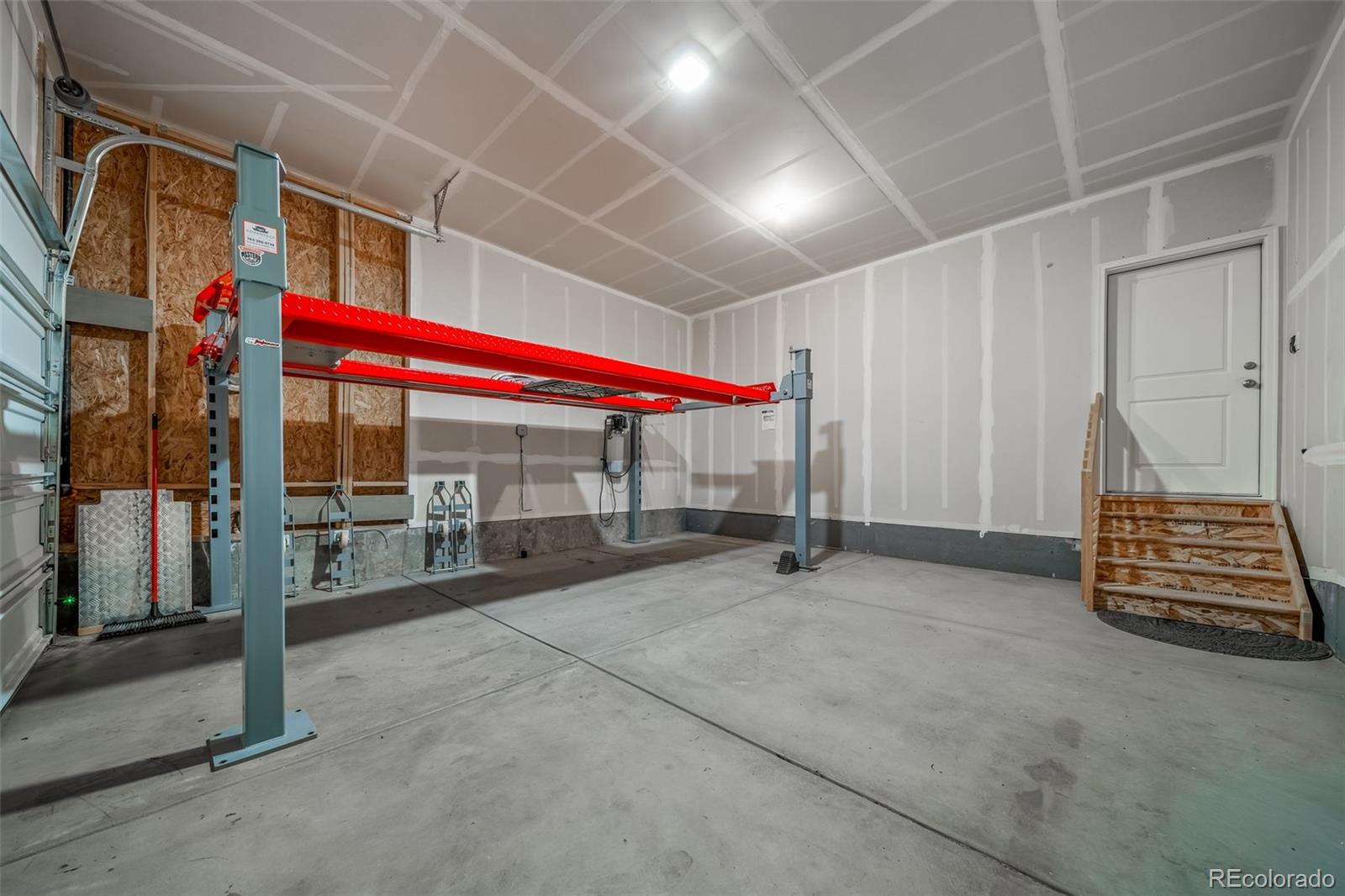 3018 Belleville Ridge Road Elizabeth, CO 80107 - Photo 24 of 32 a view of an empty room with glass windows