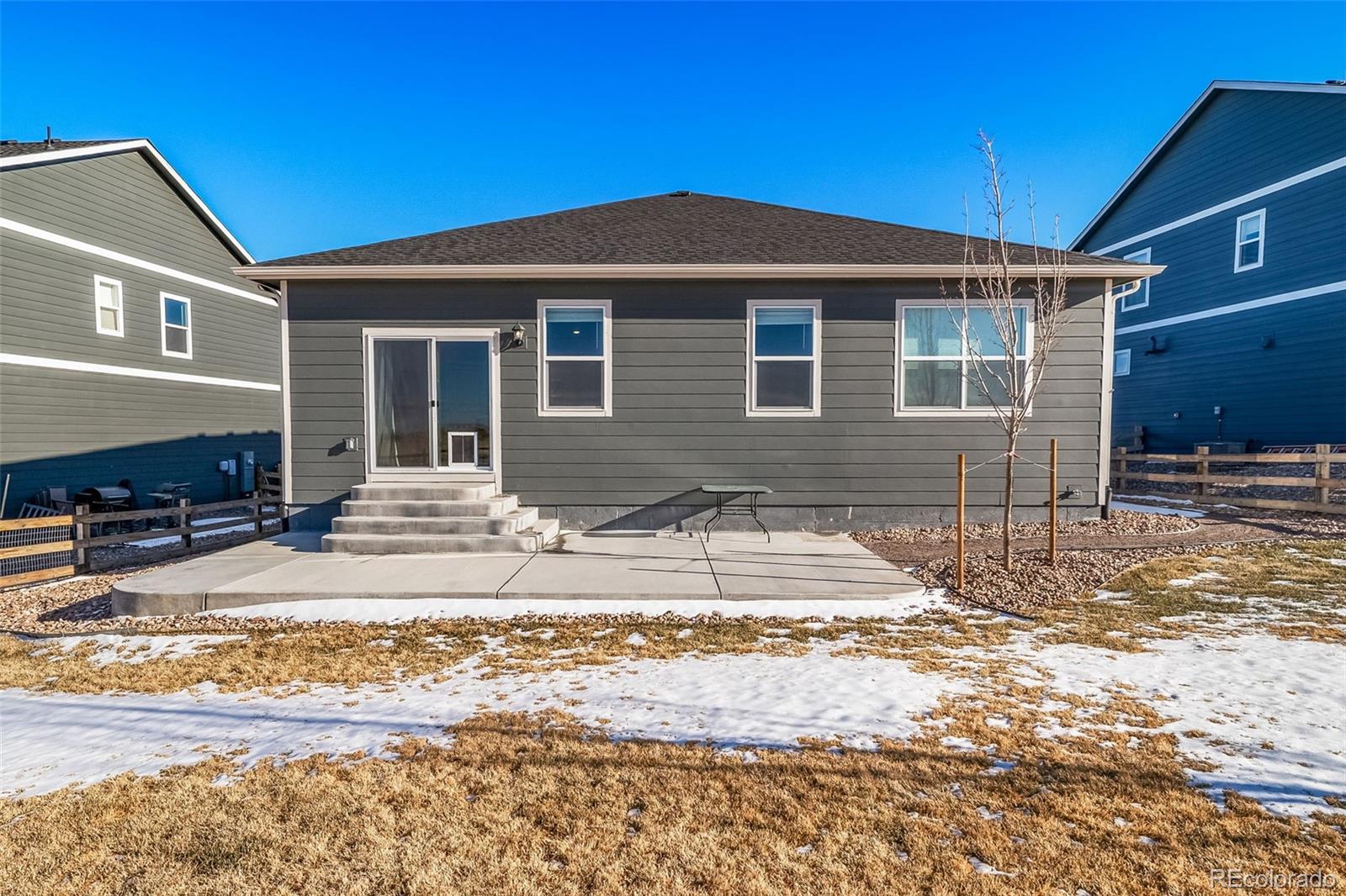3018 Belleville Ridge Road Elizabeth, CO 80107 - Photo 26 of 32 a front view of a house with a yard