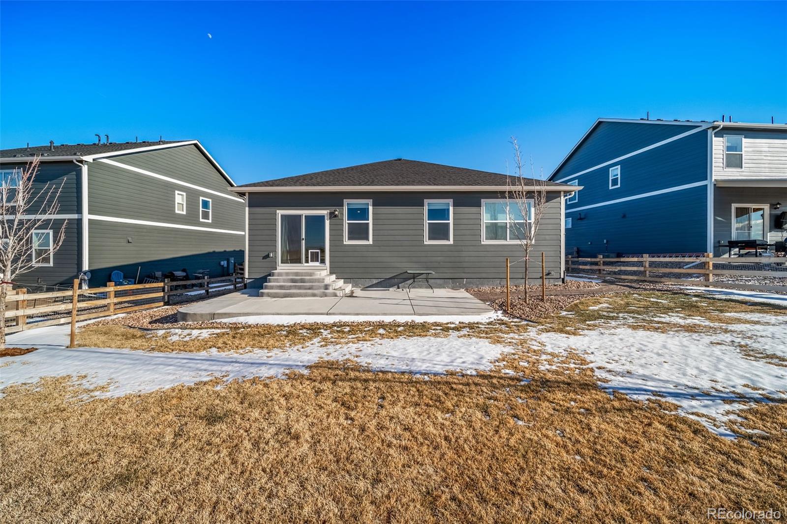 3018 Belleville Ridge Road Elizabeth, CO 80107 - Photo 27 of 32 a front view of a house with a yard